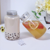 Glass Round Beverage Drinking Bottles with Screw Hole Lid